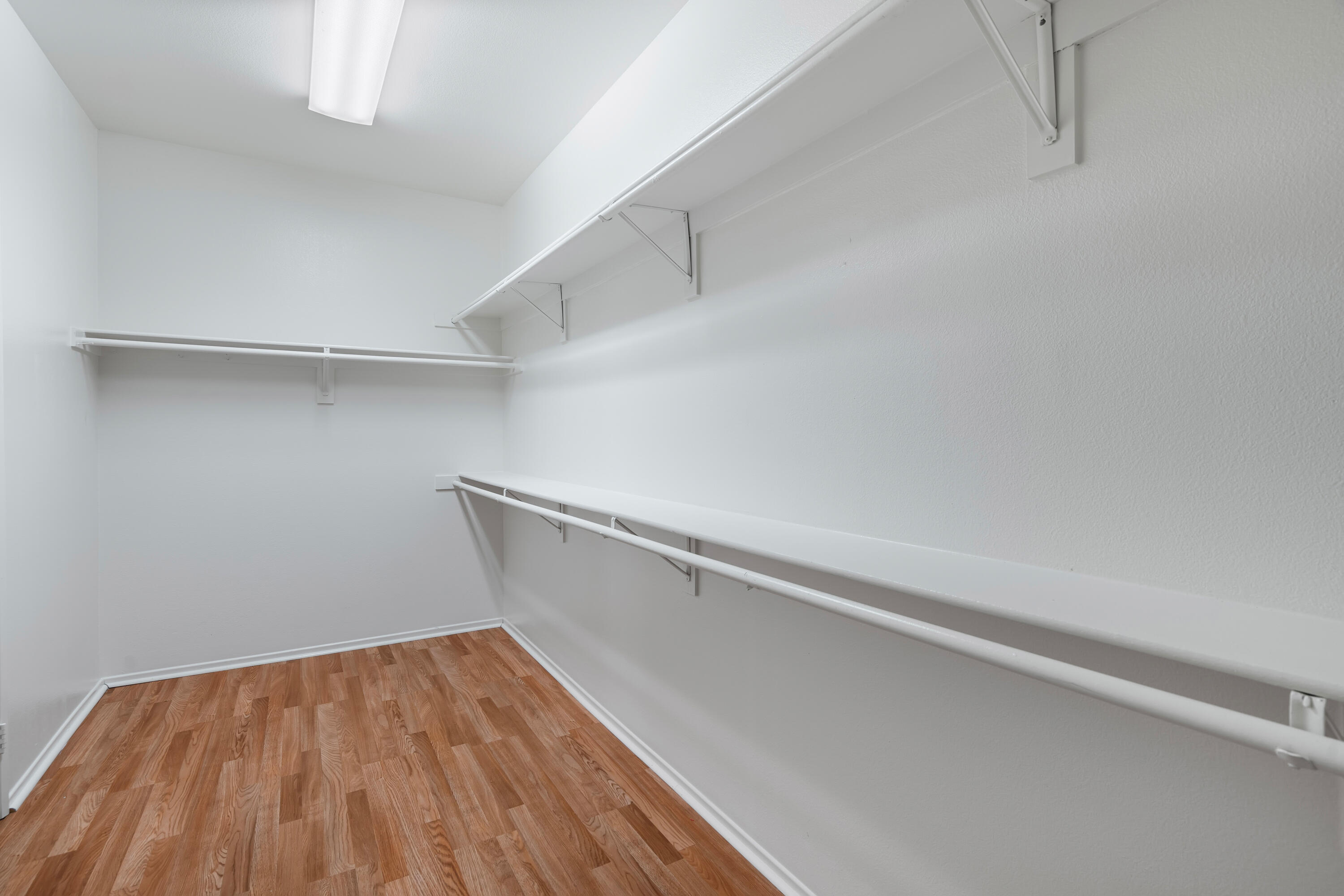 83160 Shadow Hills Way Indio, CA 92203 - Photo 32 of 50 a view of a room with wooden floor