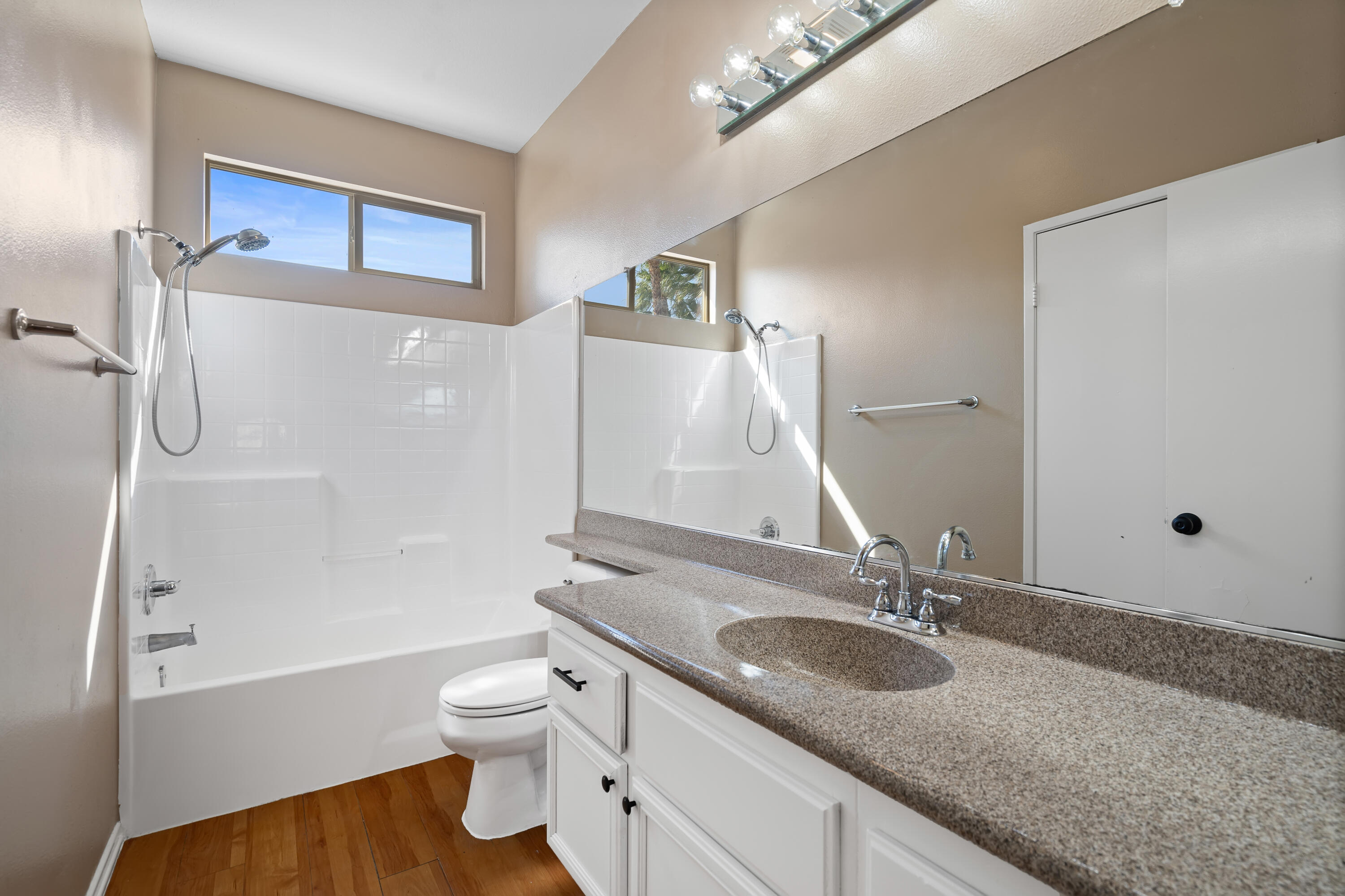 83160 Shadow Hills Way Indio, CA 92203 - Photo 37 of 50 a bathroom with a granite countertop sink toilet and shower