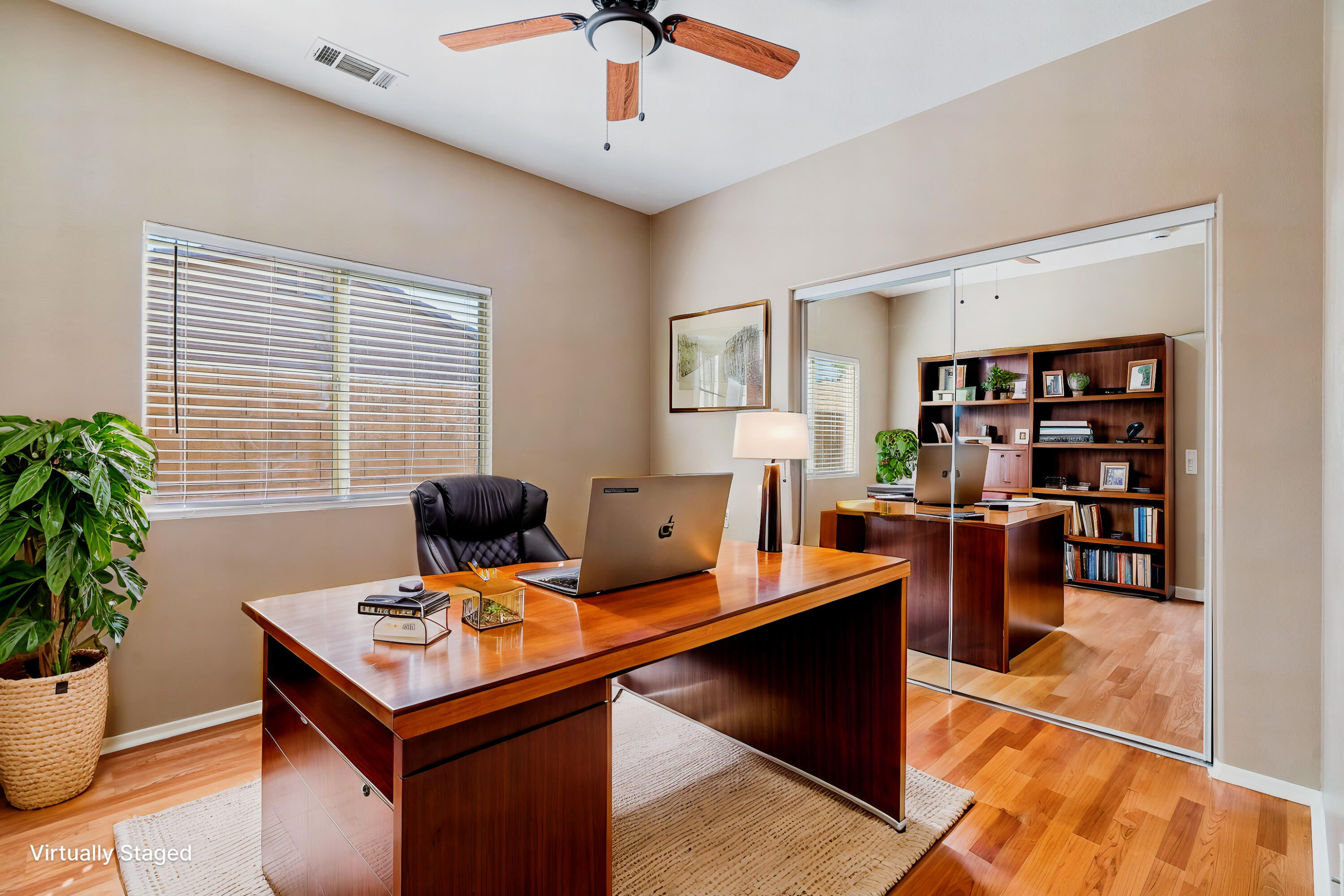 83160 Shadow Hills Way Indio, CA 92203 - Photo 40 of 50 a view of a workspace with furniture and a potted plant