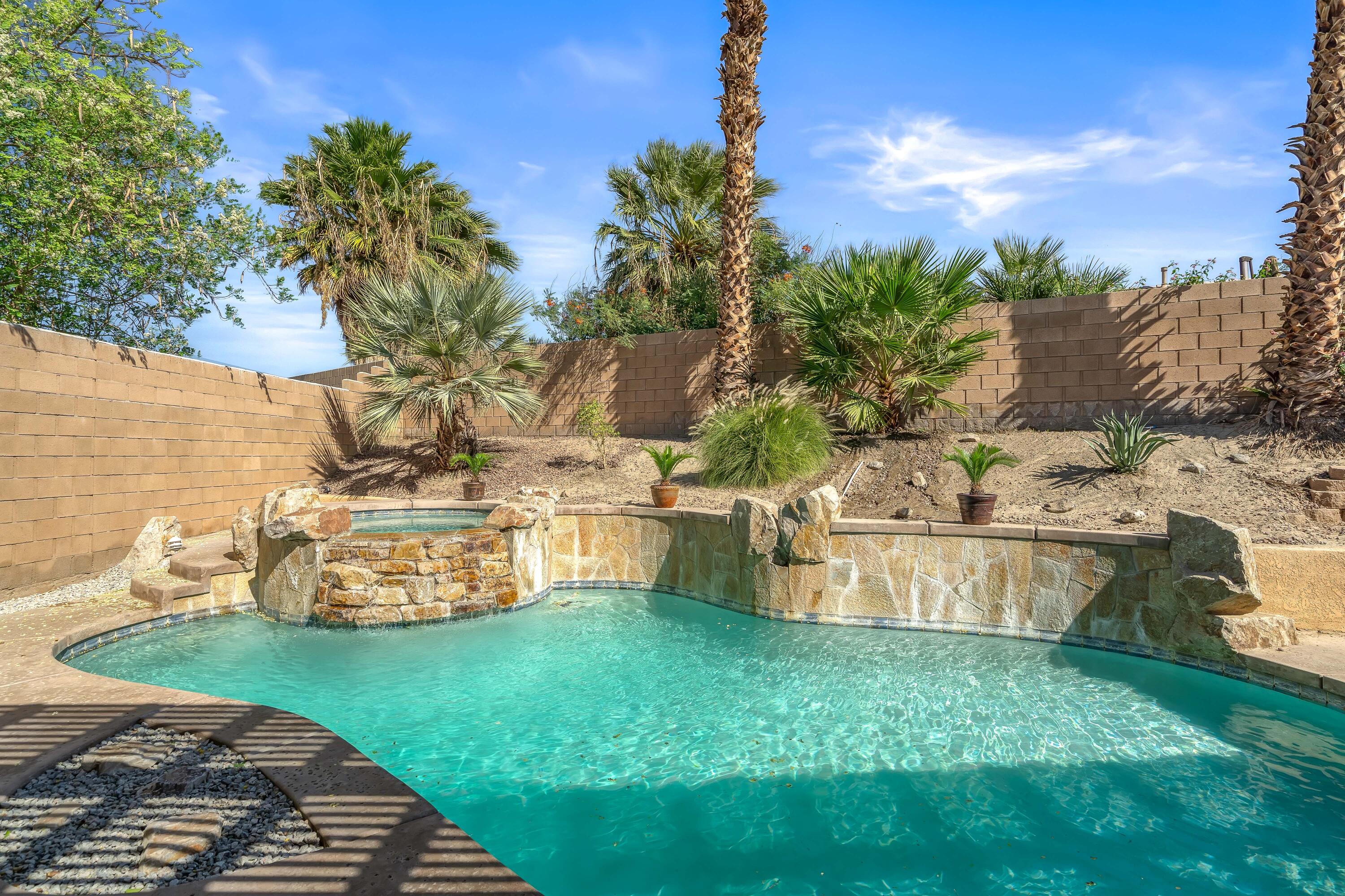 83160 Shadow Hills Way Indio, CA 92203 - Photo 42 of 50 a view of a backyard with swimming pool