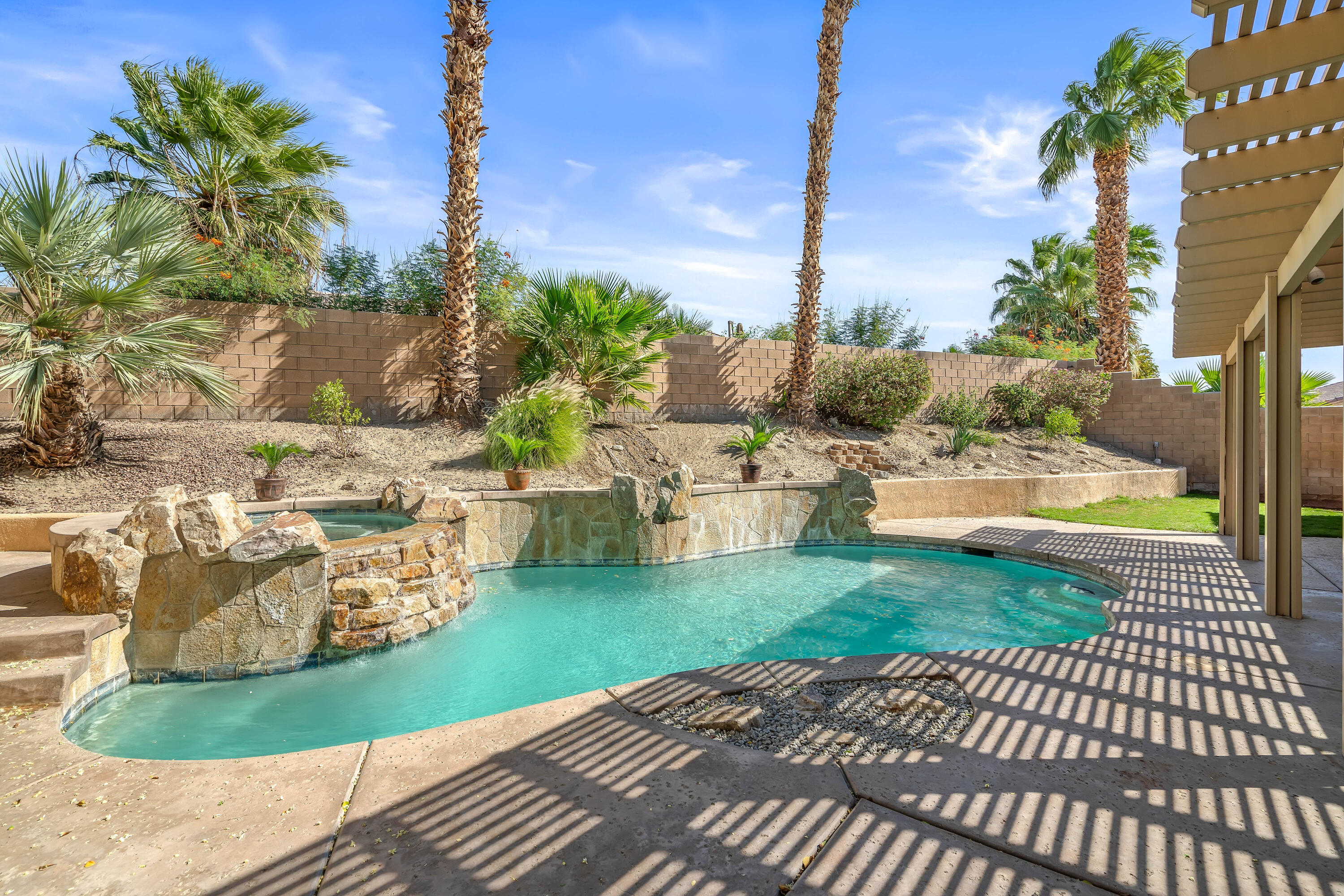 83160 Shadow Hills Way Indio, CA 92203 - Photo 45 of 50 a view of a terrace with a garden