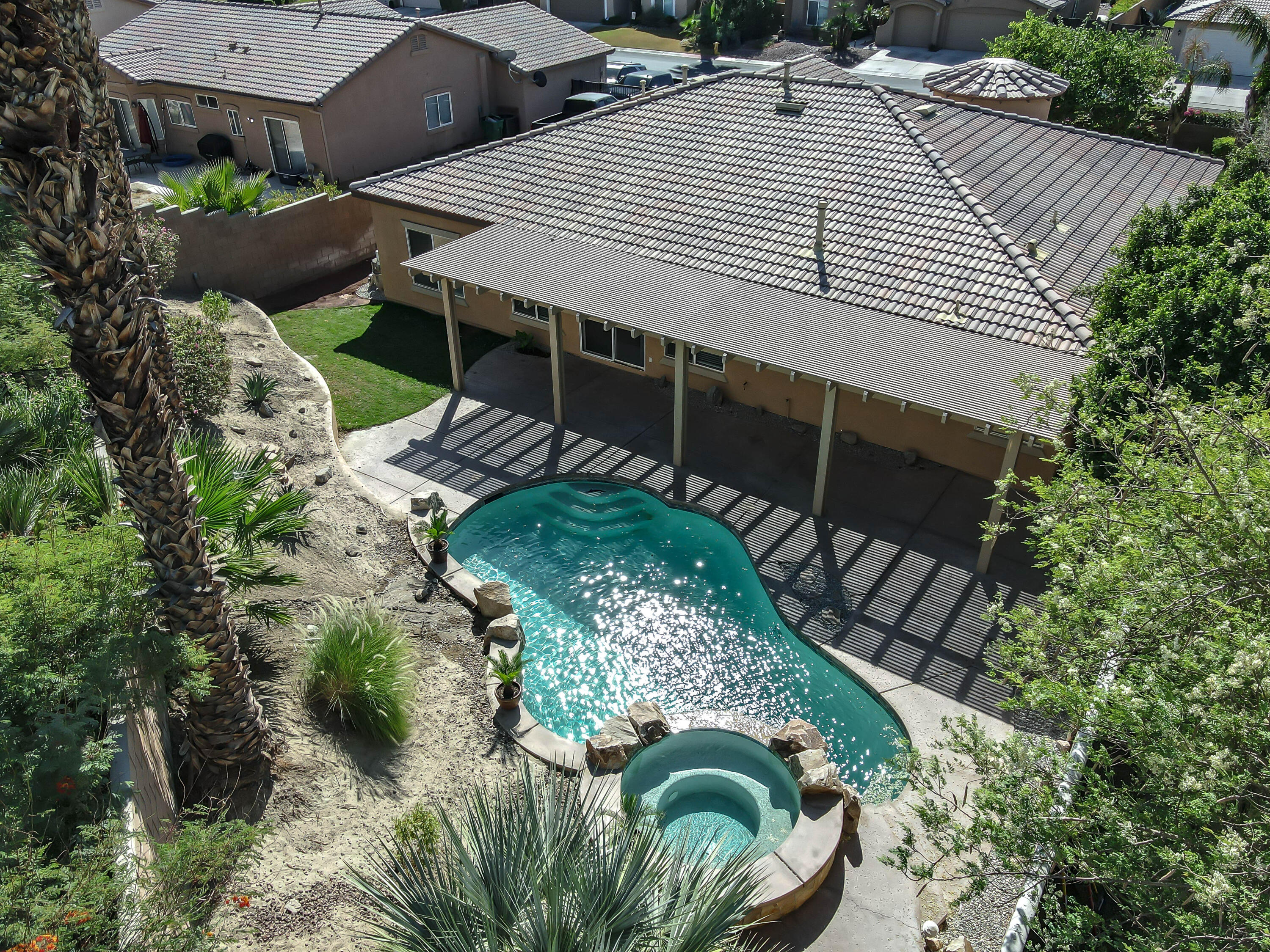83160 Shadow Hills Way Indio, CA 92203 - Photo 50 of 50 an aerial view of a house with a yard and potted plants