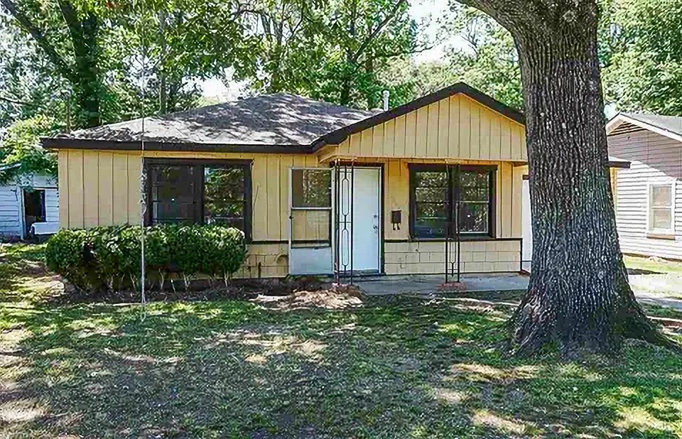 4425 Harding Drive Beaumont, TX 77703 - Photo 2 of 16 a view of a house with a yard