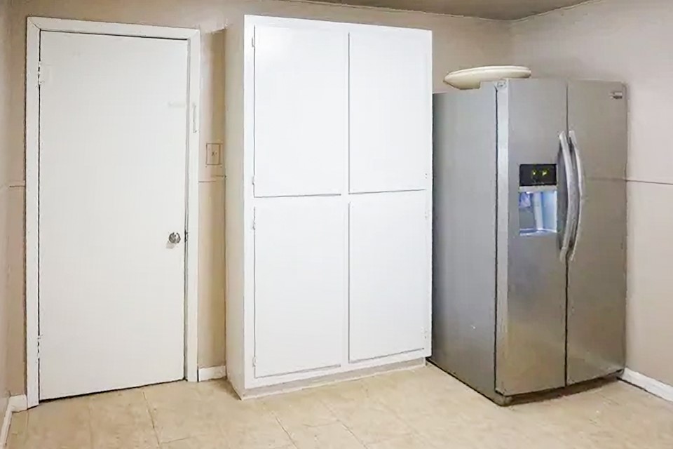 4425 Harding Drive Beaumont, TX 77703 - Photo 6 of 16 a view of a room with a refrigerator