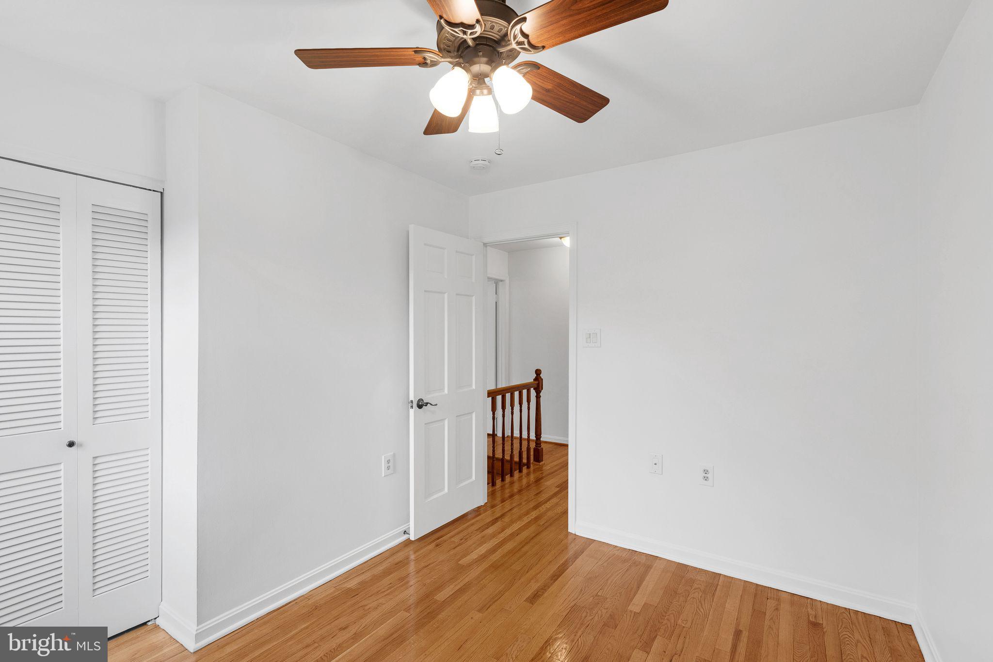 1772 Dryden Way Crofton, MD 21114 - Photo 14 of 34 a view of empty room with wooden floor