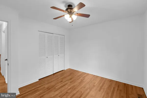 a view of a big room with wooden floor