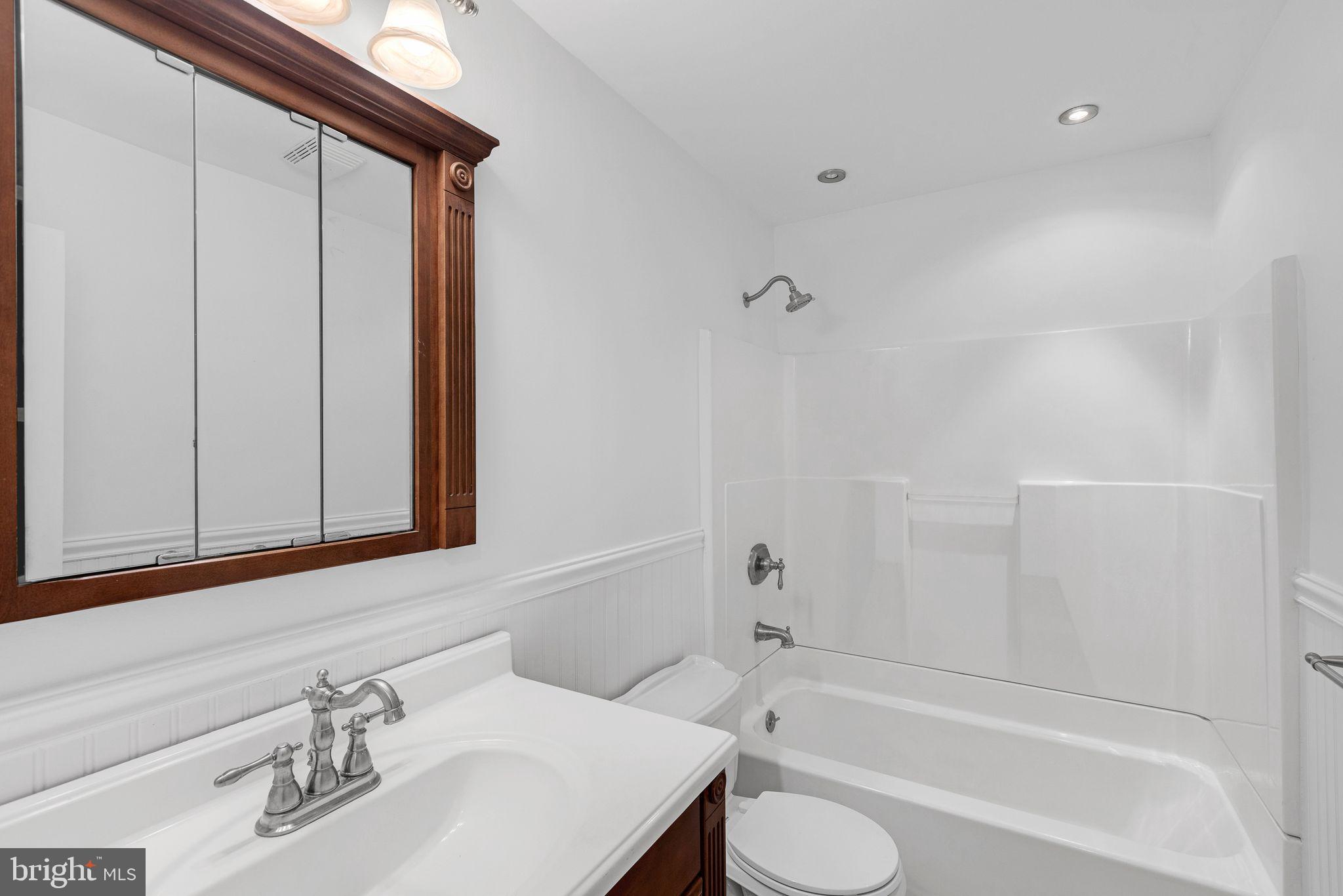 1772 Dryden Way Crofton, MD 21114 - Photo 23 of 34 a bathroom with a sink and a bathtub
