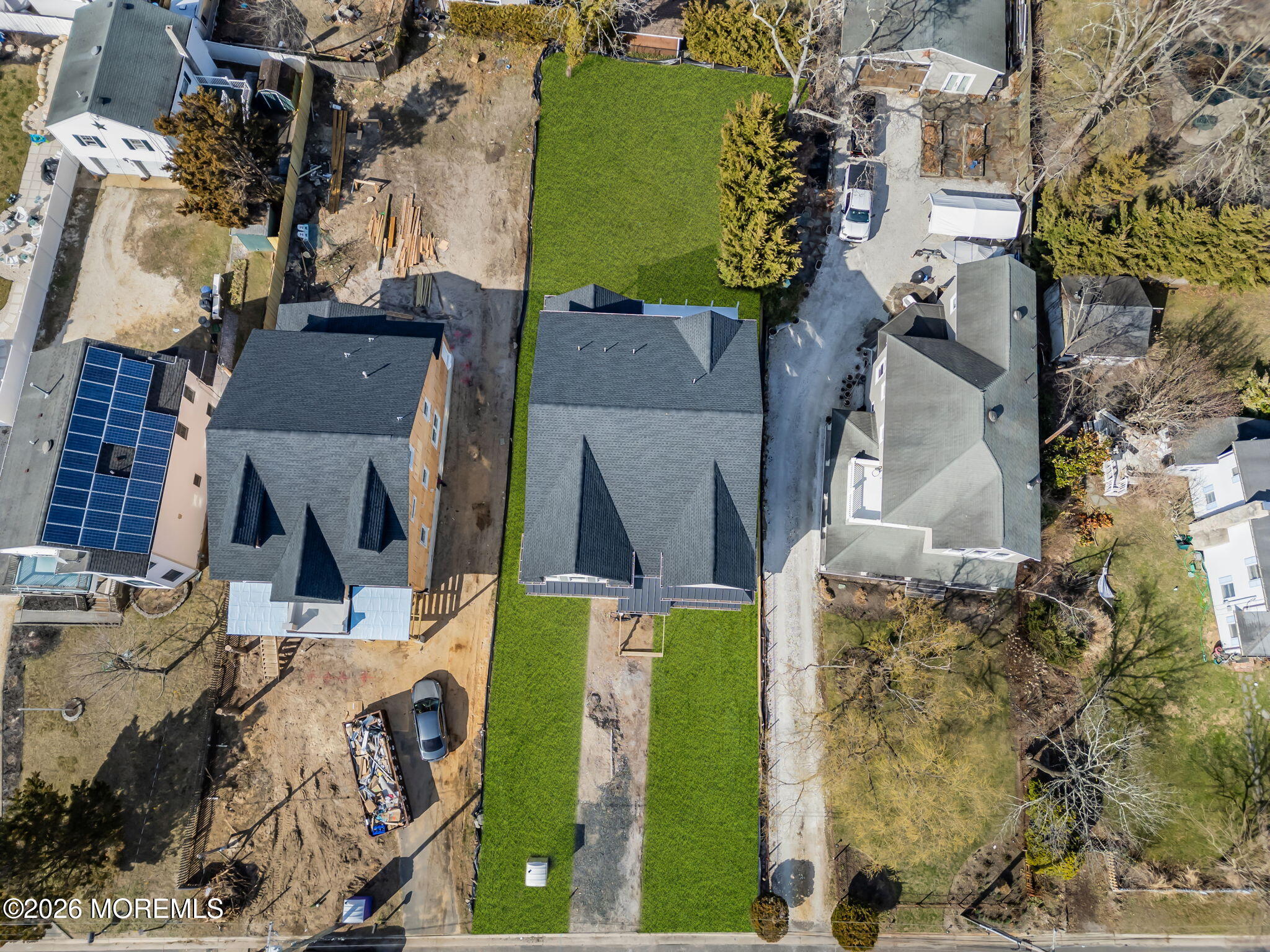 729 Mt Place Point Pleasant, NJ 08742 - Photo 7 of 12 an aerial view of a house with a swimming pool