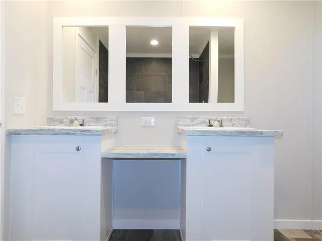 a bathroom with a sink and a bathtub