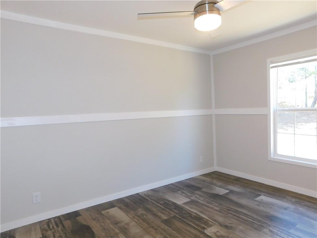 350 Galahad Road Dahlonega, GA 30533 - Photo 36 of 39 an empty room with a window