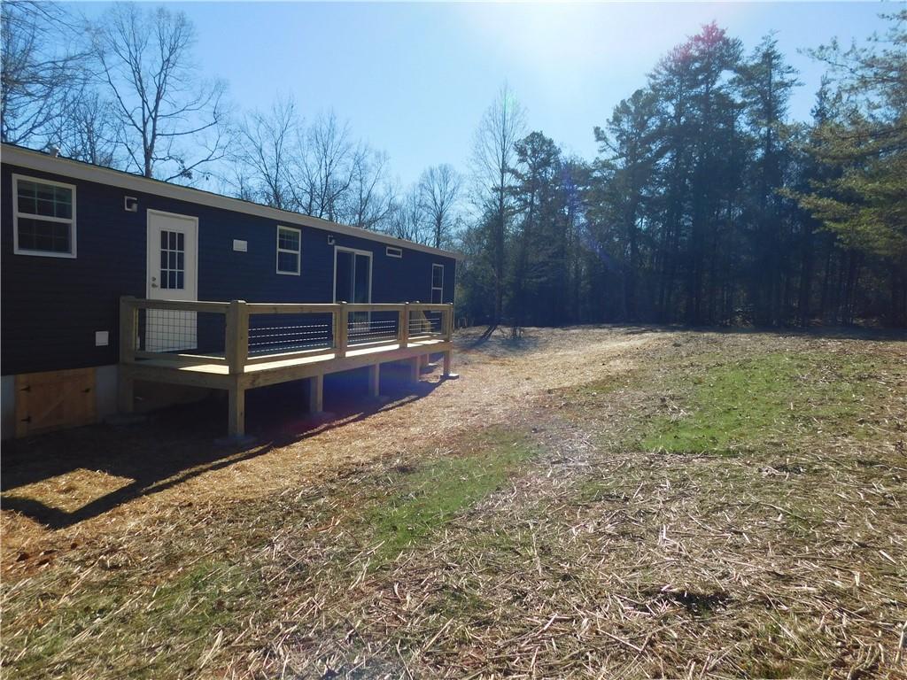 350 Galahad Road Dahlonega, GA 30533 - Photo 6 of 39 a view of backyard with trees
