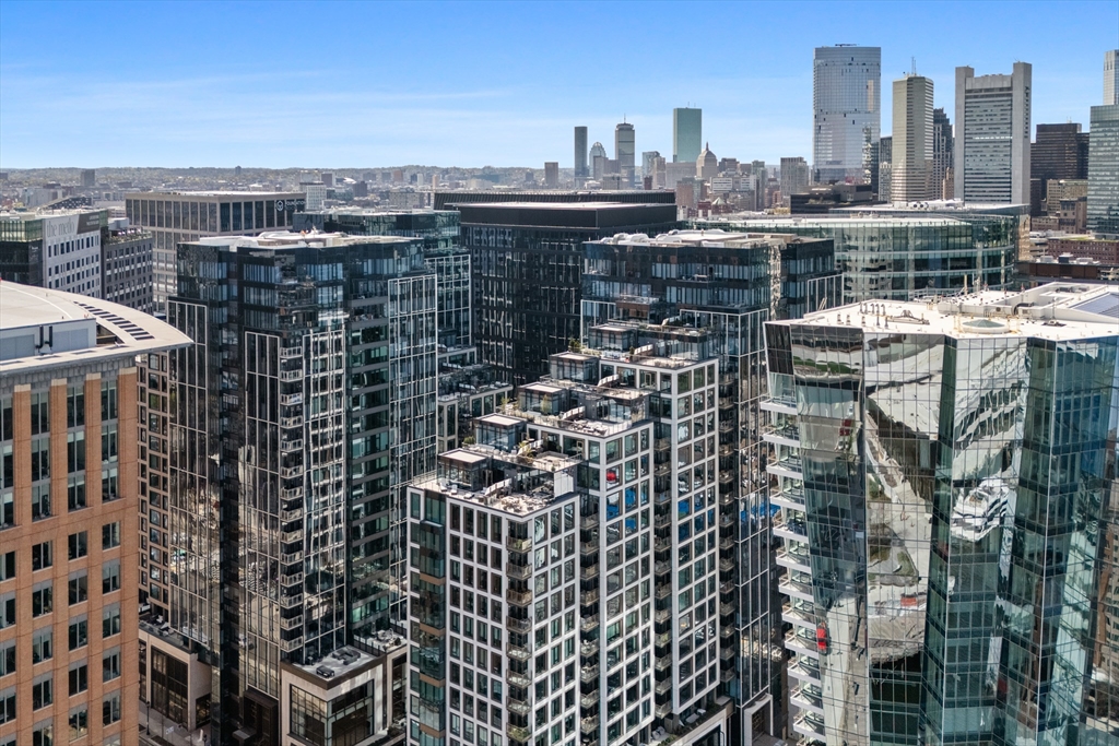 135 Seaport Boulevard, Unit 1902 Boston, MA 02210 - Photo 38 of 40 a city view with tall buildings