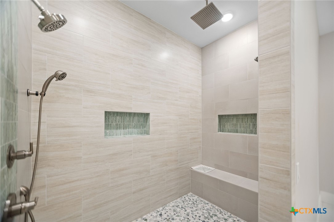 2062 Harrison Avenue Port O'Connor, TX 77982 - Photo 27 of 48 a bathroom with a toilet and a shower
