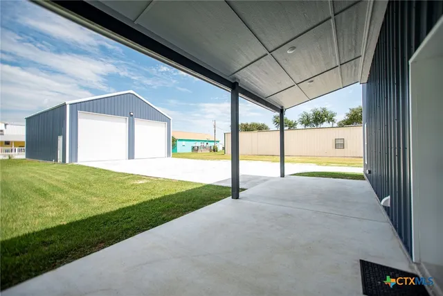 a view of an entryway with a garden