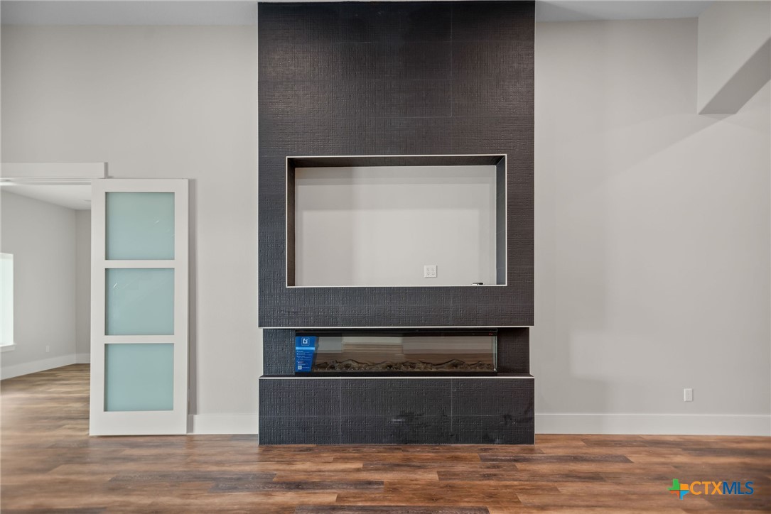 2062 Harrison Avenue Port O'Connor, TX 77982 - Photo 7 of 48 a living room with a fireplace