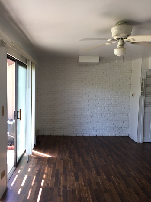 57 Vail Colony, Unit 2 Fox Lake, IL 60020 - Photo 7 of 12 wooden floor in a room next to a window