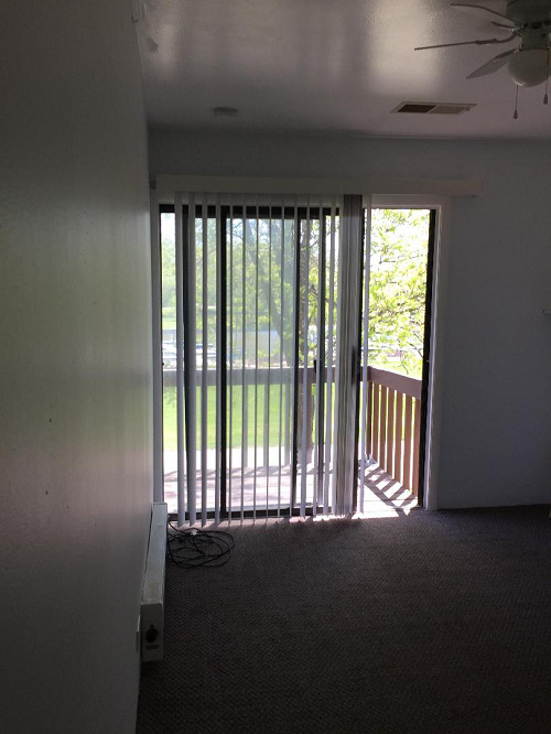 57 Vail Colony, Unit 2 Fox Lake, IL 60020 - Photo 8 of 12 a view of an empty room with a window