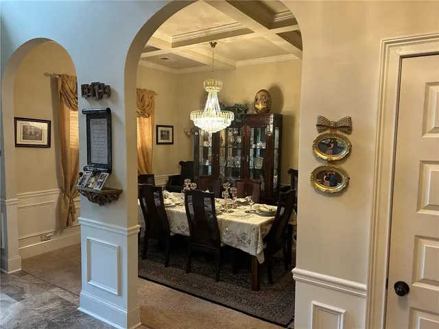 a view of living room and dining room