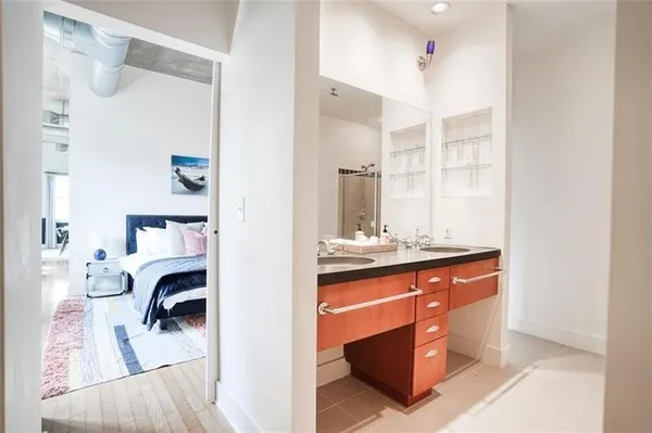 a view of living room with furniture and a fireplace