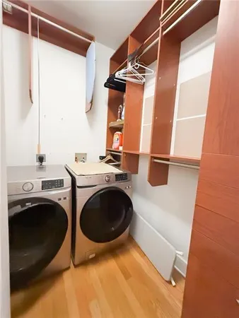 a utility room with dryer and washer