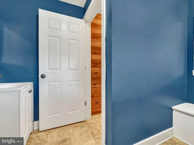 a view of bathroom with a toilet