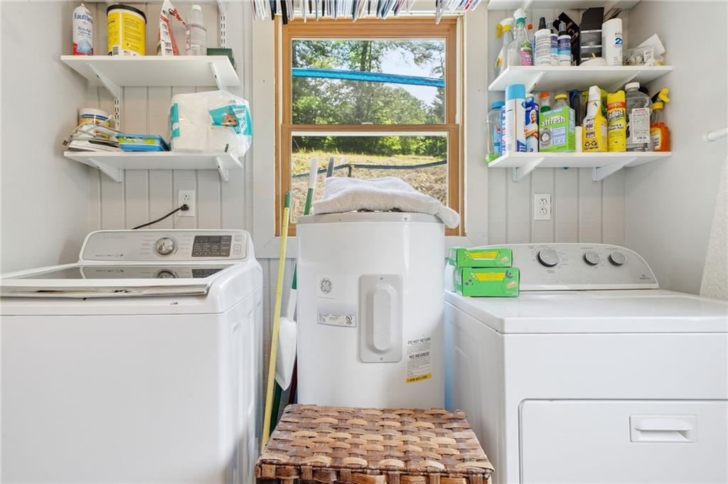 1709 Harrington Road Ball Ground, GA 30107 - Photo 15 of 46 a utility room with dryer and washer