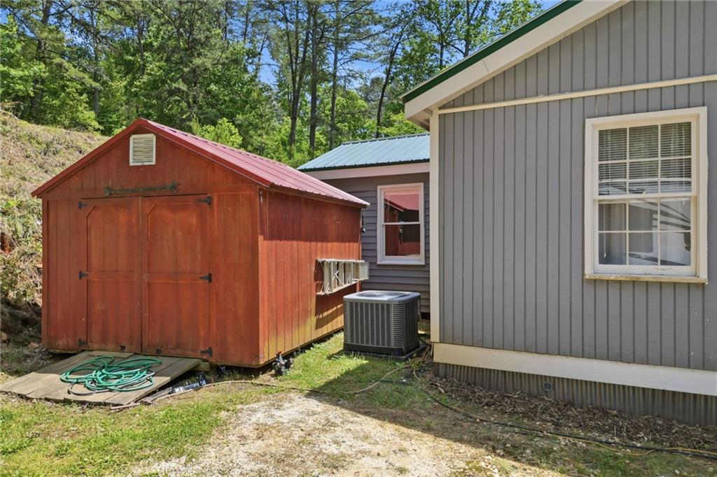 1709 Harrington Road Ball Ground, GA 30107 - Photo 34 of 46 a backyard of a house