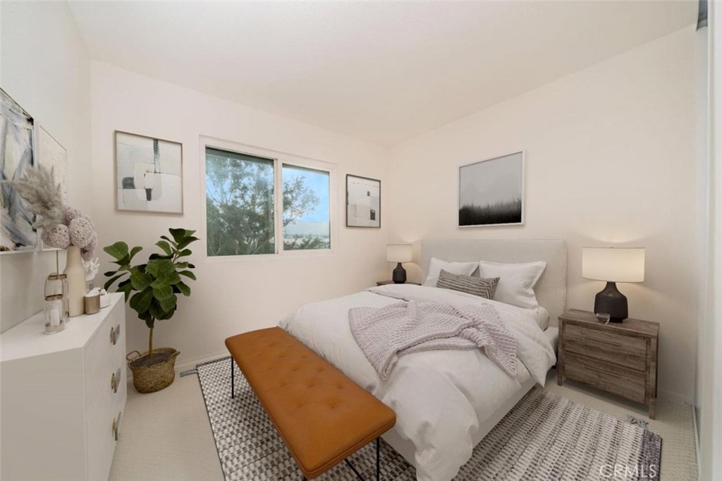 1118 Fallbrook Drive Corona, CA 92878 - Photo 15 of 30 a bedroom with a bed and a potted plant