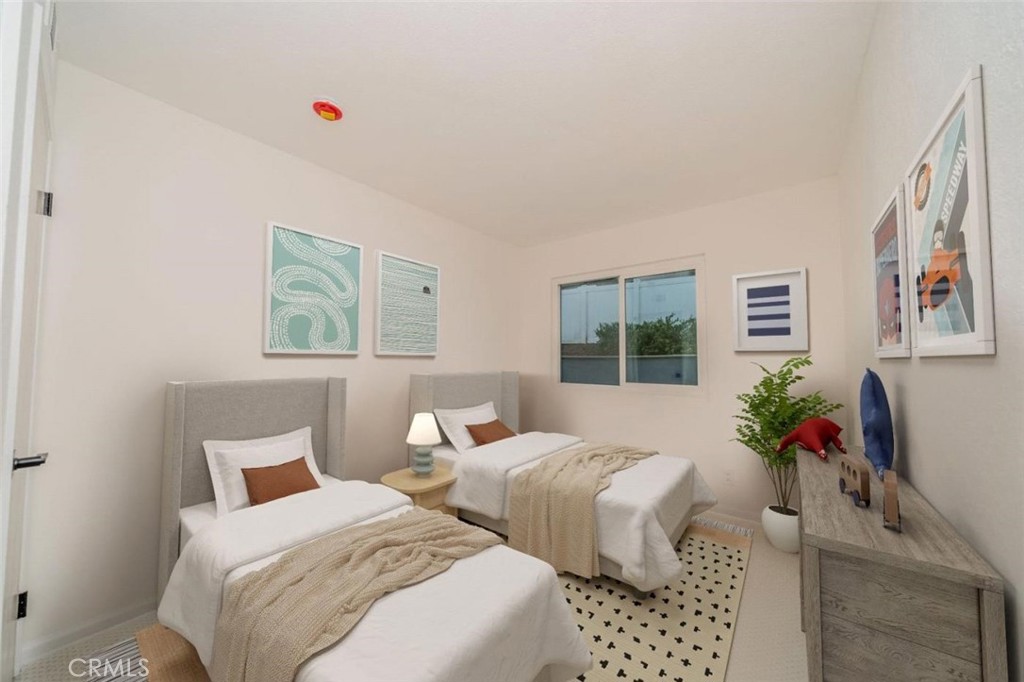 1118 Fallbrook Drive Corona, CA 92878 - Photo 17 of 30 a bedroom with two beds and a potted plant