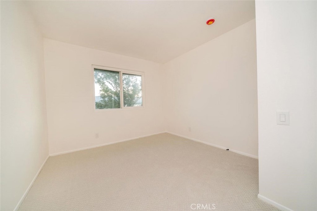 1118 Fallbrook Drive Corona, CA 92878 - Photo 20 of 30 an empty room with windows