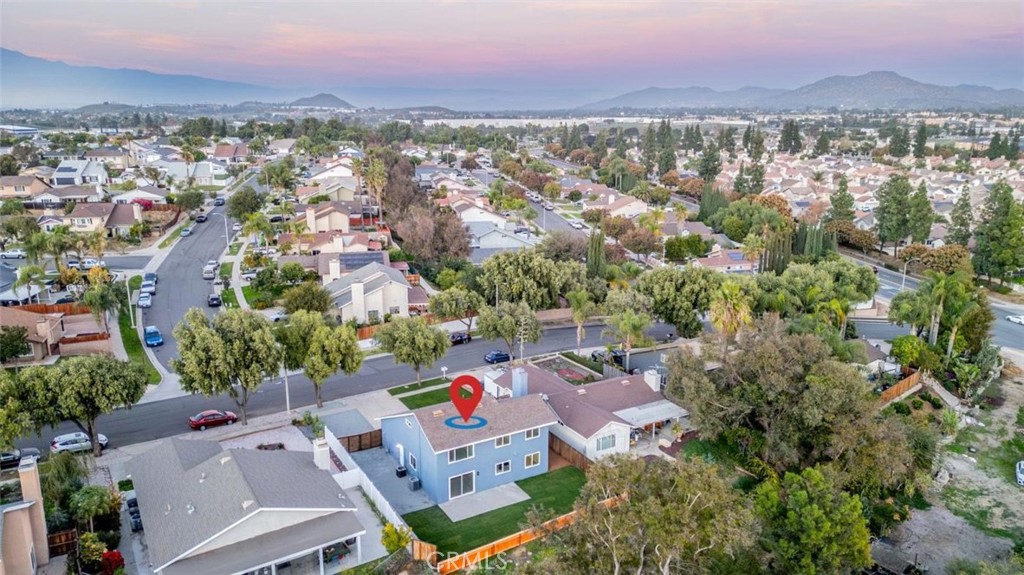 1118 Fallbrook Drive Corona, CA 92878 - Photo 28 of 30 an aerial view of a city with lots of residential buildings and mountain view in back
