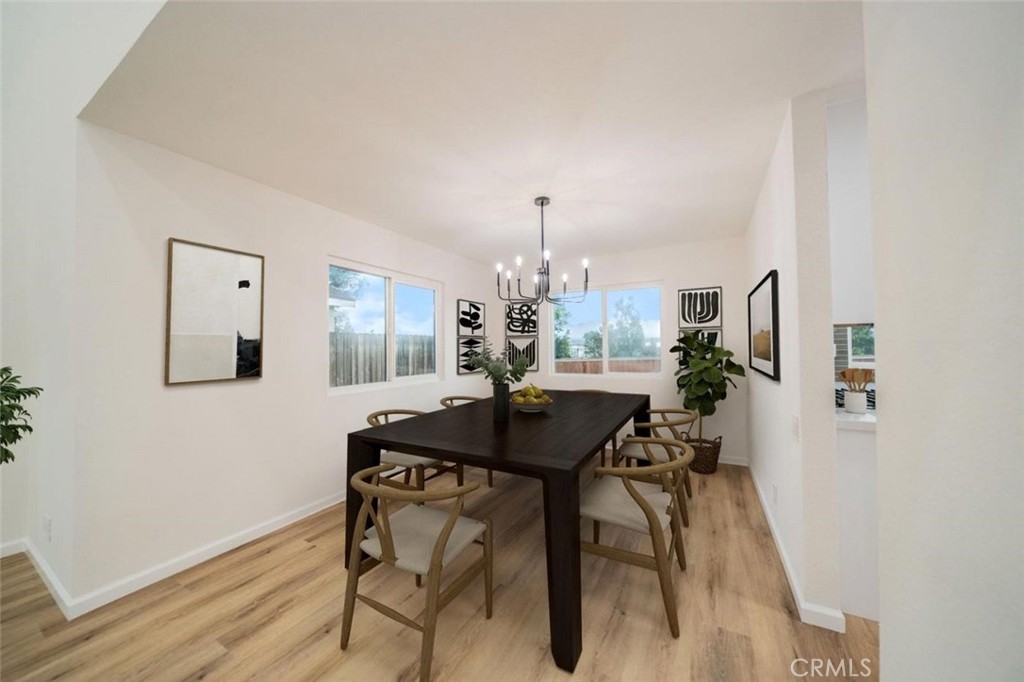 1118 Fallbrook Drive Corona, CA 92878 - Photo 8 of 30 a view of a dining room with furniture and window