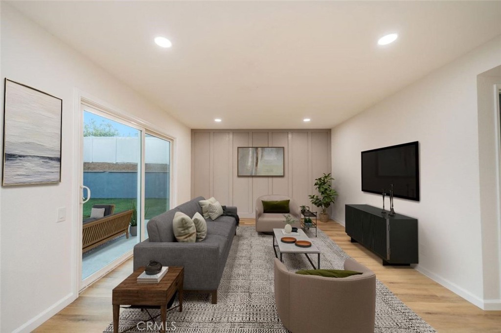 1118 Fallbrook Drive Corona, CA 92878 - Photo 10 of 30 a living room with furniture and a flat screen tv