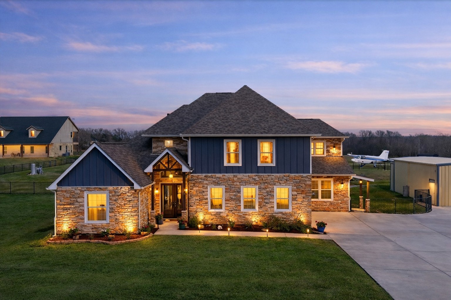 a front view of a house with a yard