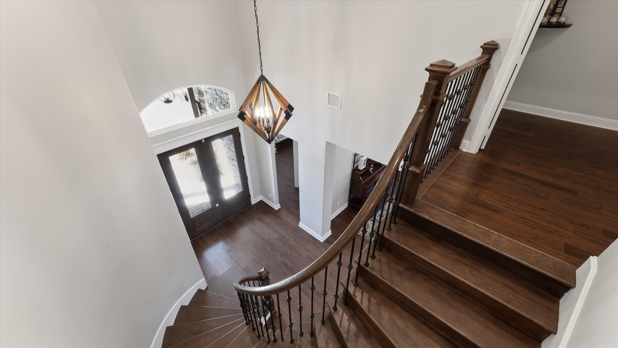 24 Longhorn Loop New Waverly, TX 77358 - Photo 19 of 45 a view of entryway and hall with wooden floor