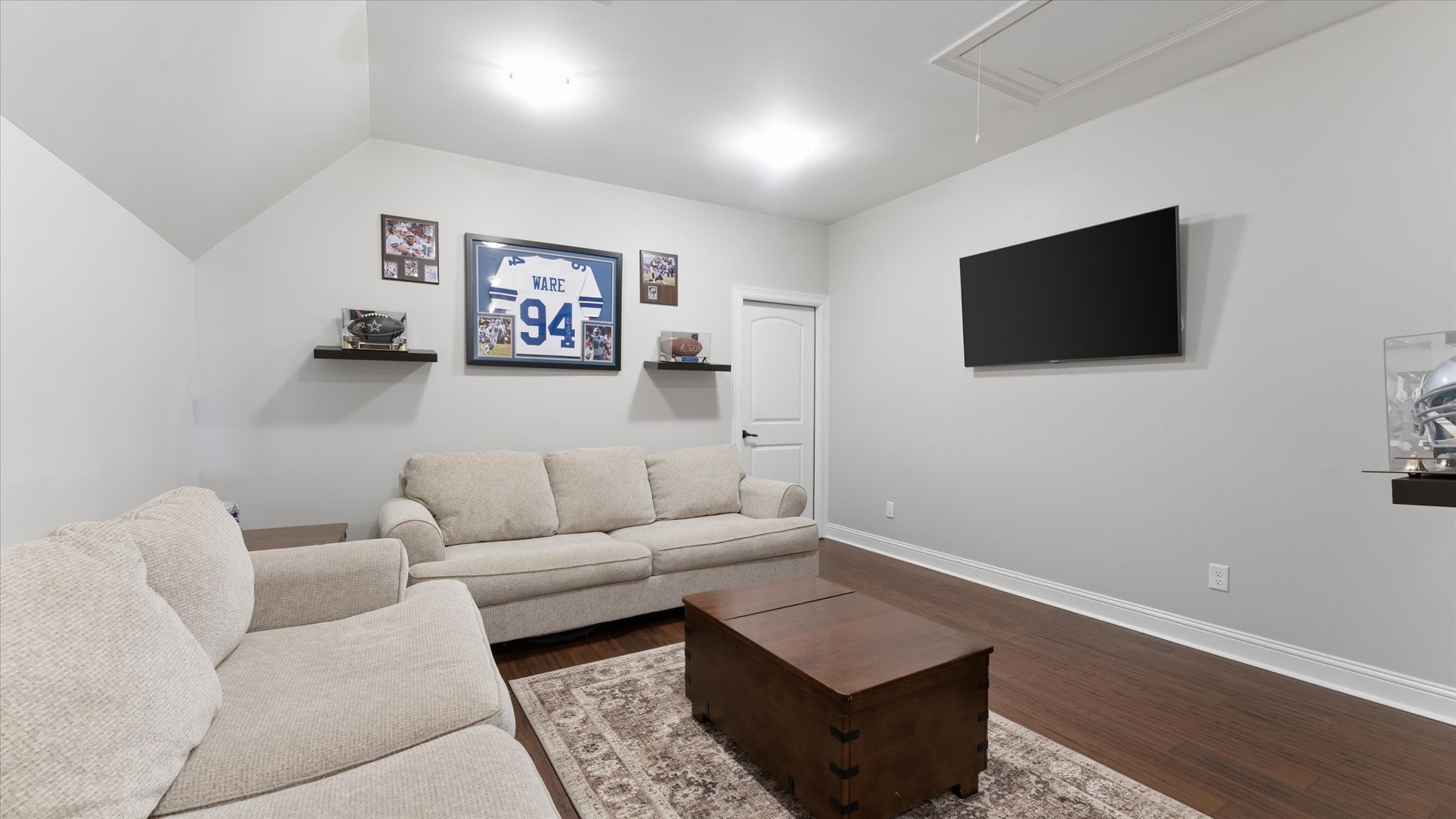 24 Longhorn Loop New Waverly, TX 77358 - Photo 21 of 45 a living room with furniture and a flat screen tv