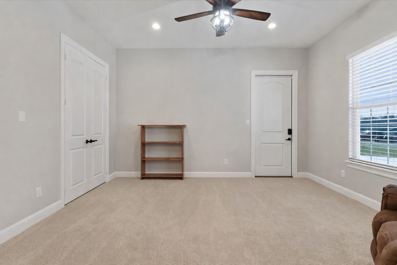 24 Longhorn Loop New Waverly, TX 77358 - Photo 30 of 45 an empty room with windows and closet