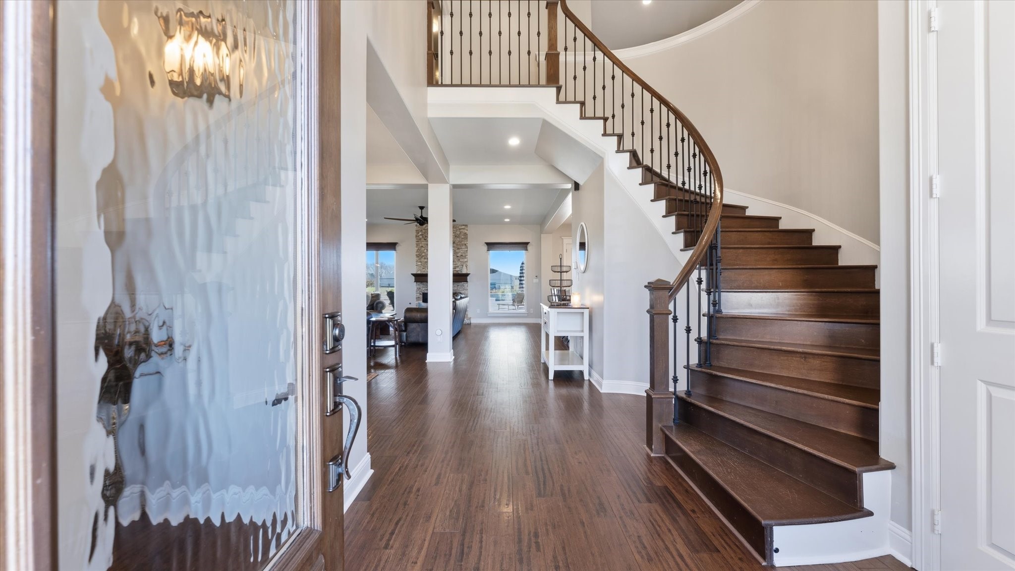 24 Longhorn Loop New Waverly, TX 77358 - Photo 5 of 45 a view of entryway and hall with wooden floor