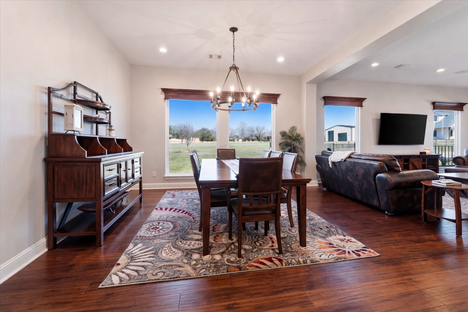 24 Longhorn Loop New Waverly, TX 77358 - Photo 6 of 45 a view of a dining room with furniture window and wooden floor