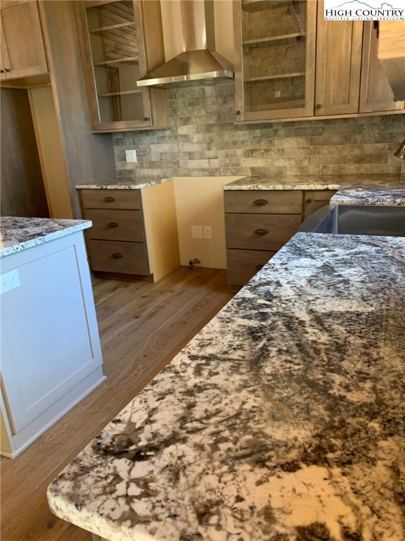 479 Rippling Waters Trail Banner Elk, NC 28604 - Photo 16 of 46 a kitchen with granite countertop a sink and cabinets