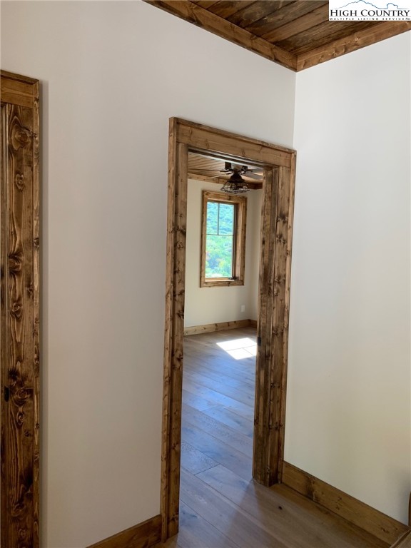 479 Rippling Waters Trail Banner Elk, NC 28604 - Photo 23 of 46 a view of a hallway with wooden floor