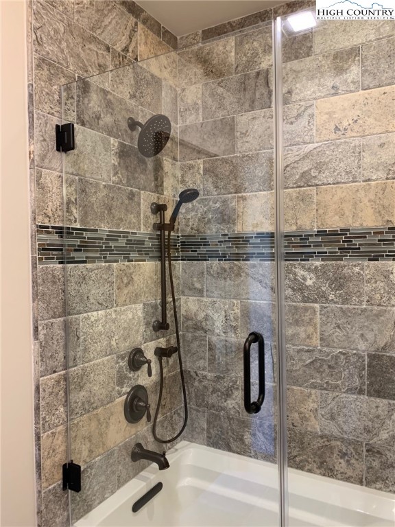 479 Rippling Waters Trail Banner Elk, NC 28604 - Photo 36 of 46 a bathroom with a shower