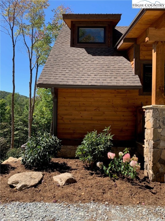 479 Rippling Waters Trail Banner Elk, NC 28604 - Photo 45 of 46 a view of a house with a yard