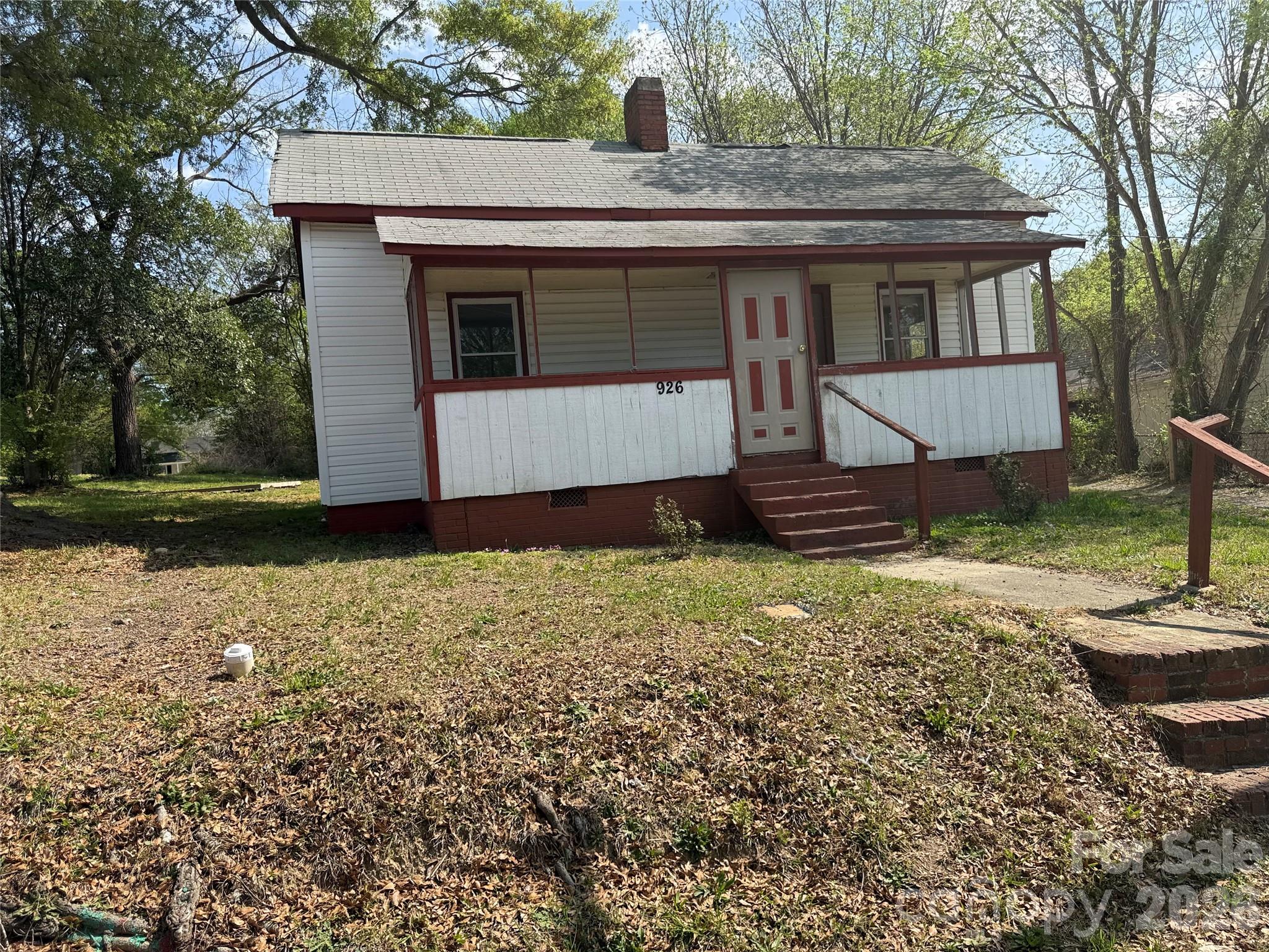 965 13th Street Lancaster, SC 29720 - Photo 1 of 17 a front view of a house with a yard