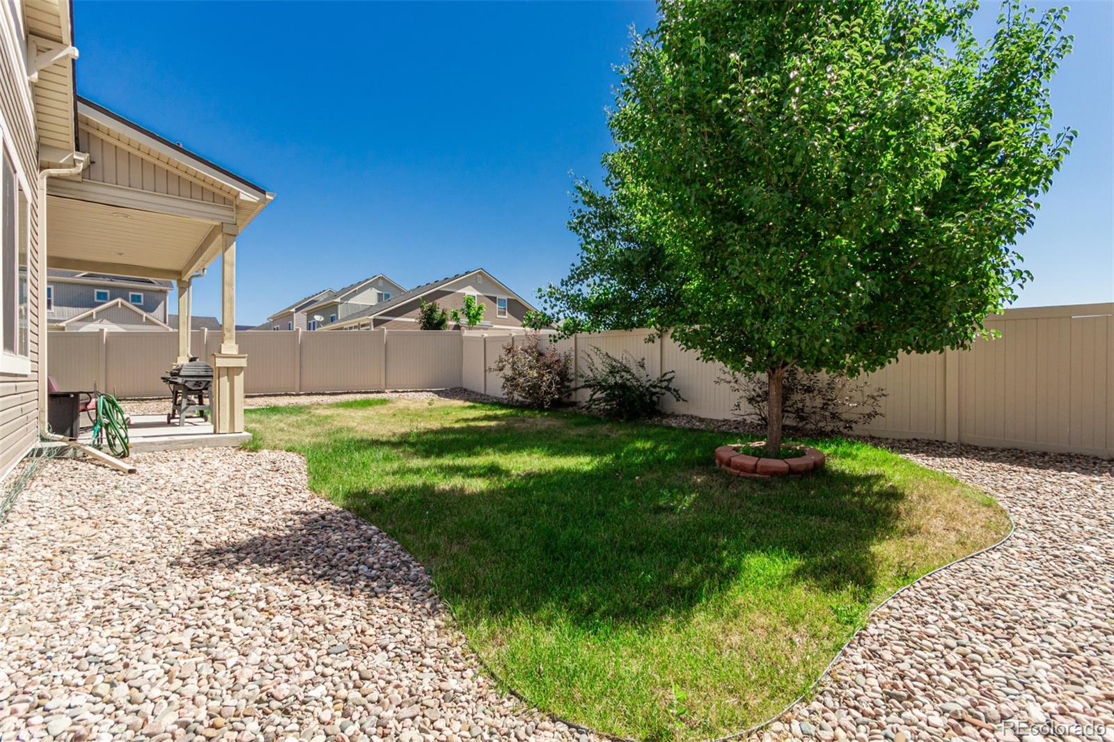 5568 Ceylon Street Denver, CO 80249 - Photo 36 of 43 a house view with a garden space