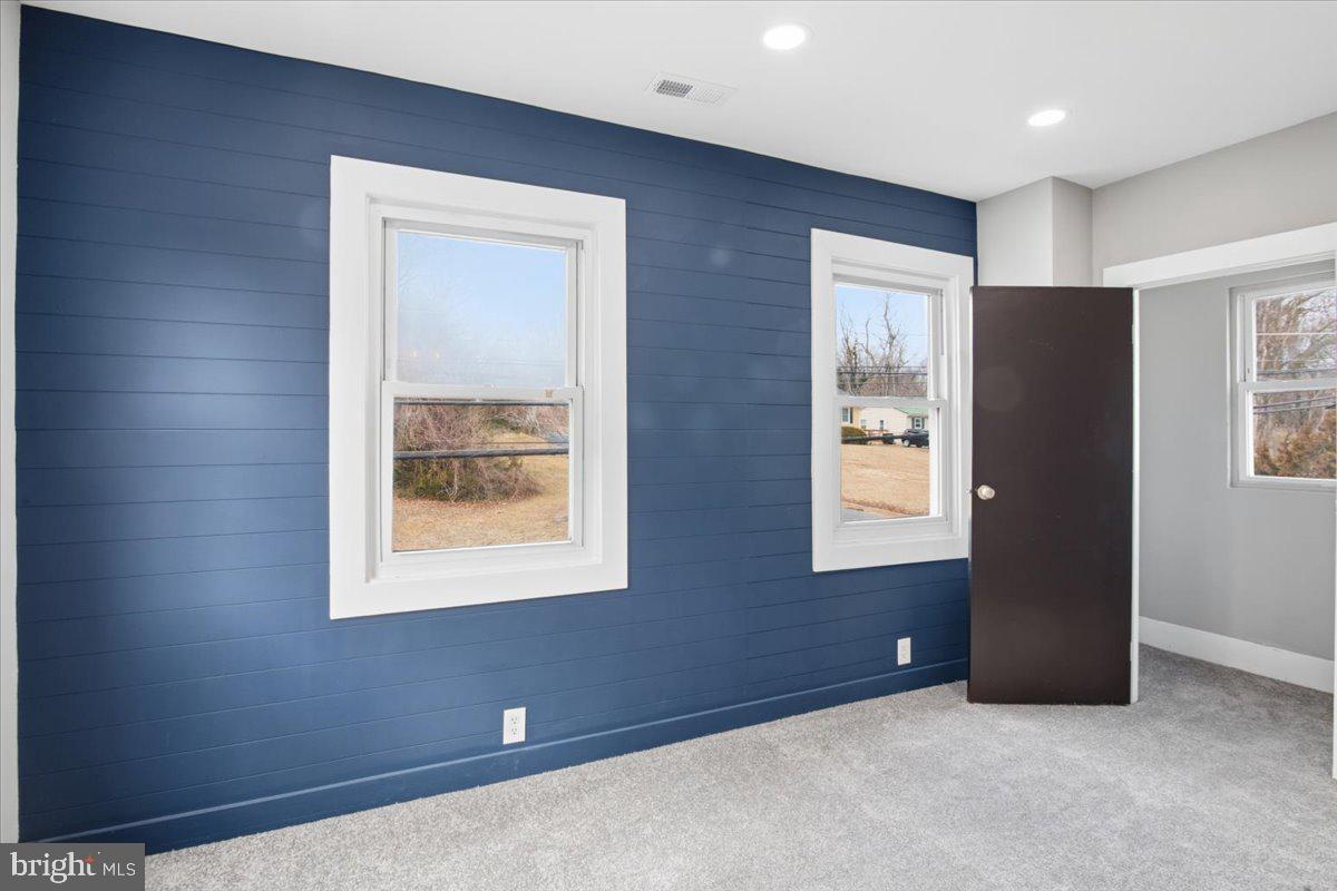 221 Denton Road Federalsburg, MD 21632 - Photo 23 of 33 a view of an empty room with closet and a window