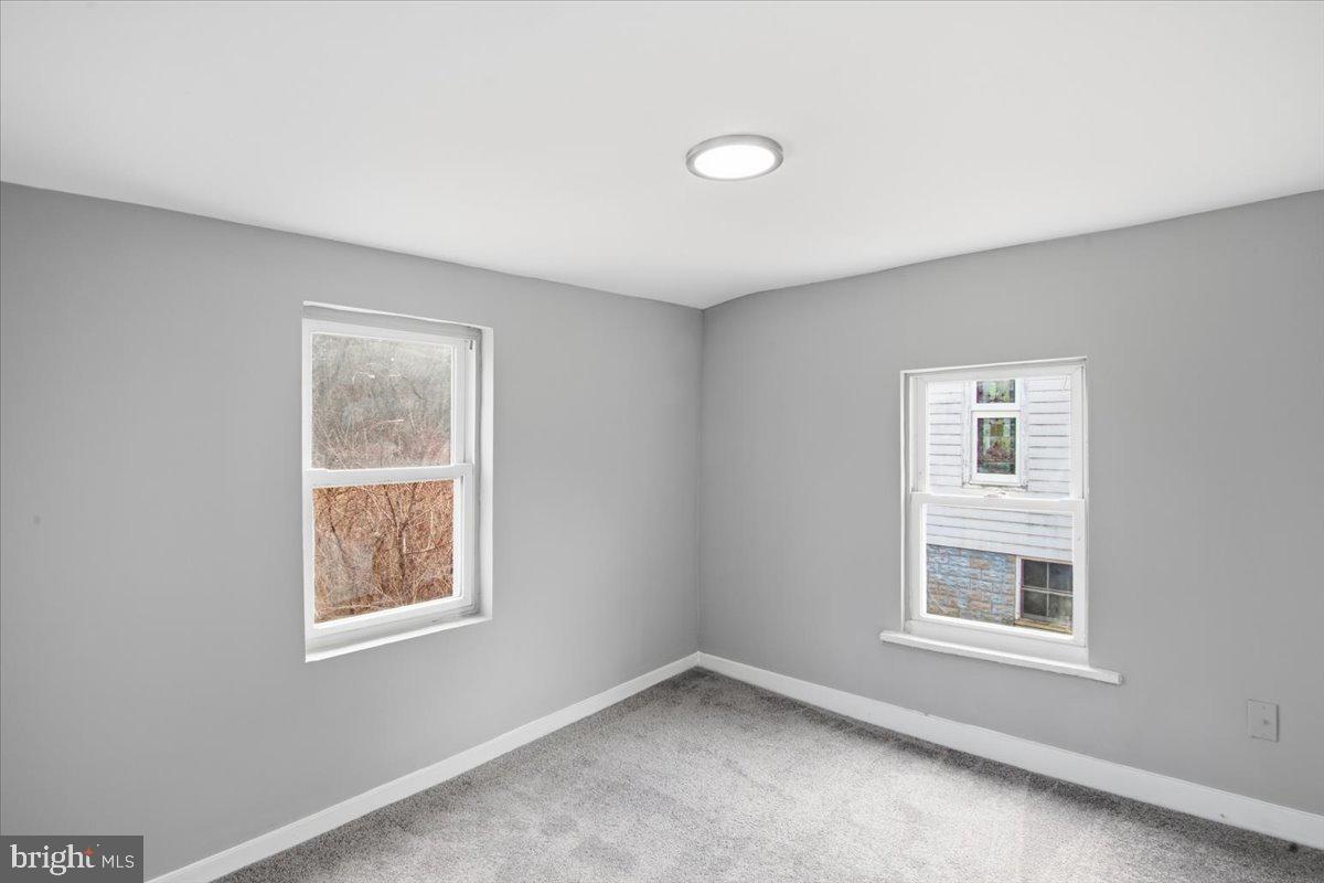 221 Denton Road Federalsburg, MD 21632 - Photo 27 of 33 a view of an empty room with a window