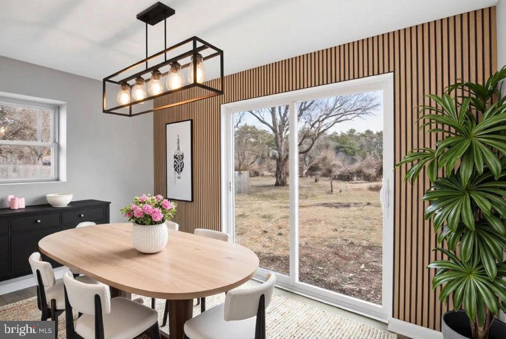 221 Denton Road Federalsburg, MD 21632 - Photo 4 of 33 a view of a dining room with furniture window and outside view