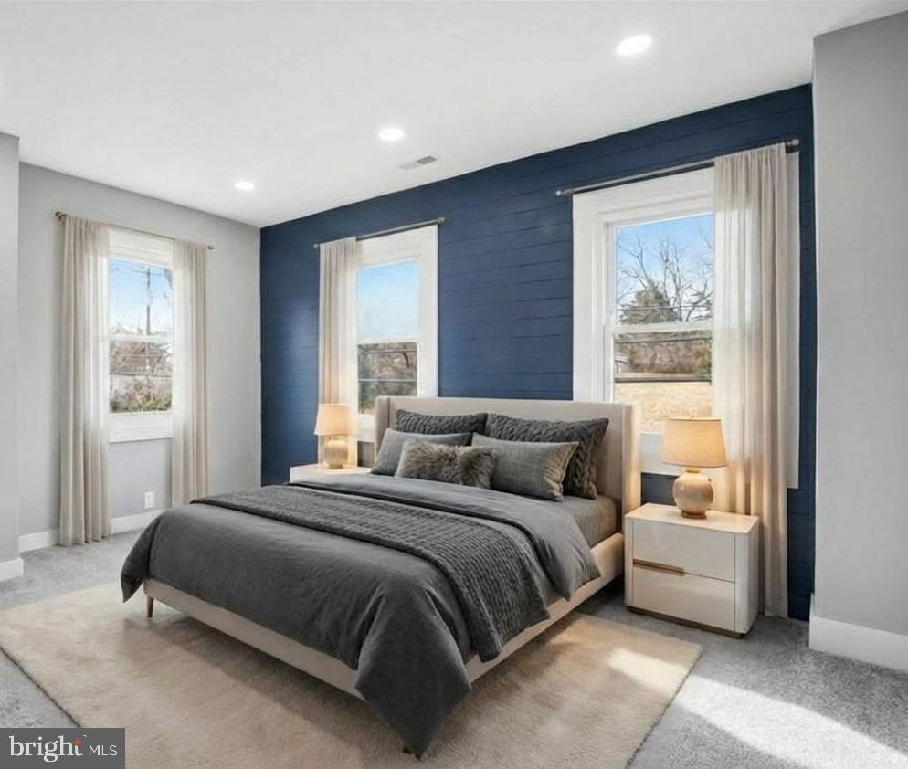 221 Denton Road Federalsburg, MD 21632 - Photo 8 of 33 a bedroom with a large bed and a window