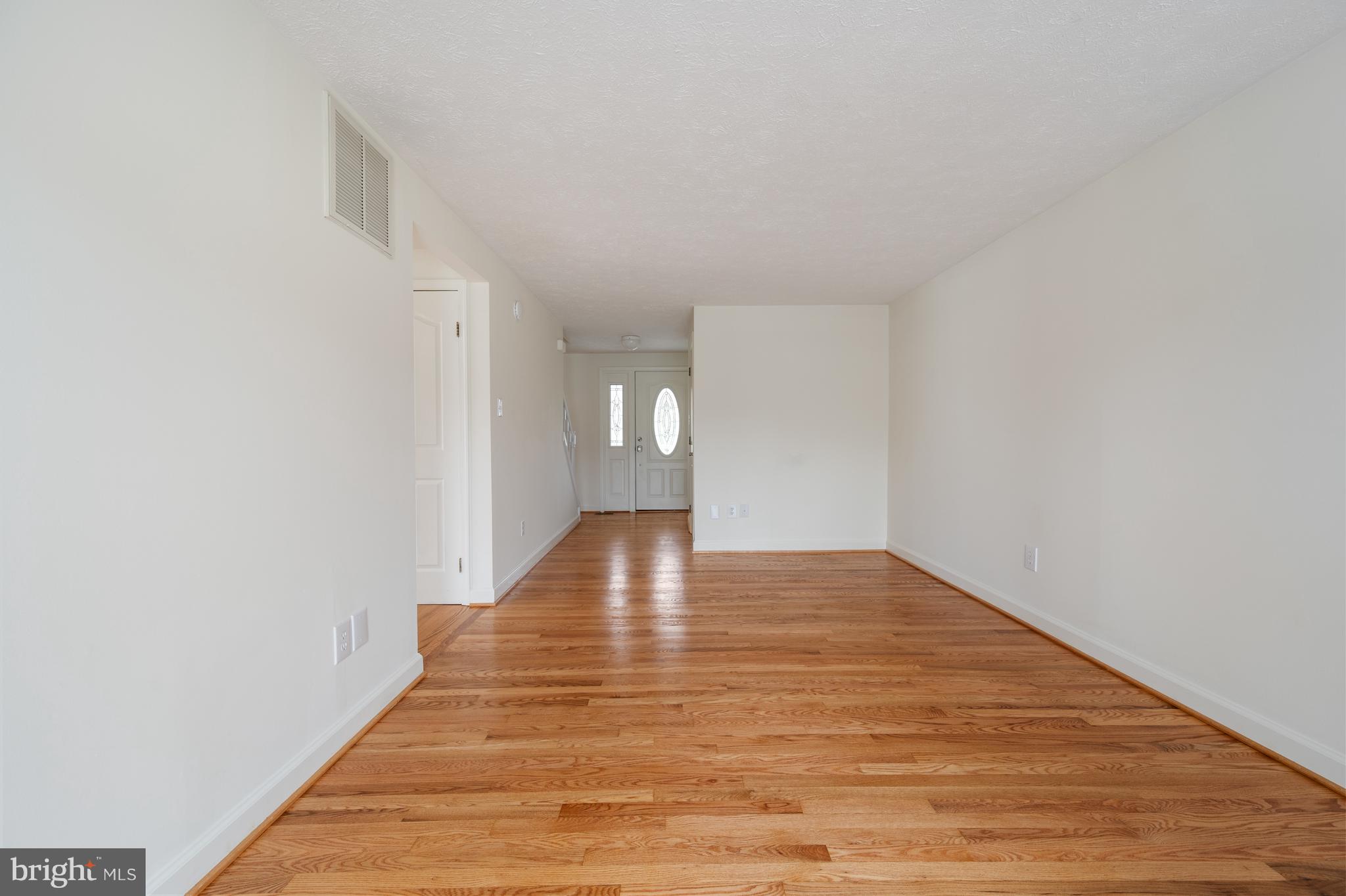 4417 Cub Run Road Chantilly, VA 20151 - Photo 11 of 57 a view of empty room with wooden floor